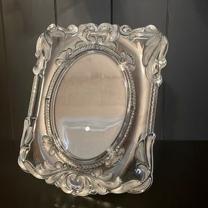 Beautiful solid glass picture frame.